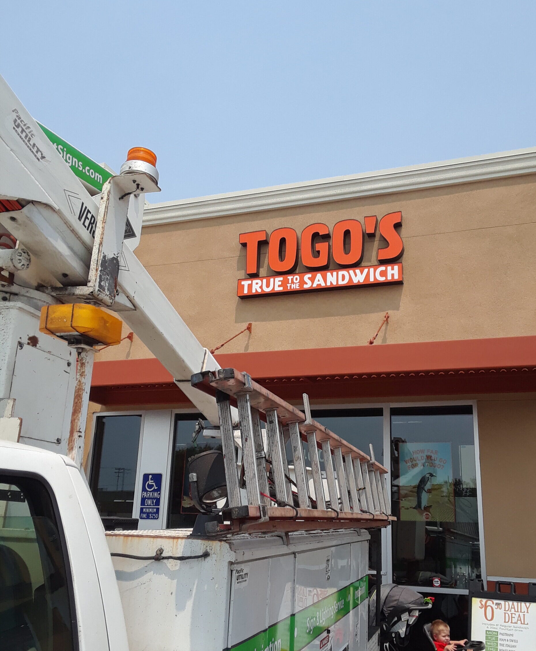 Togos - Sign installation Sacramento by Pacific West Signs